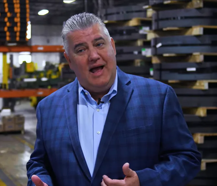 Manufacturing executive giving an on-camera interview